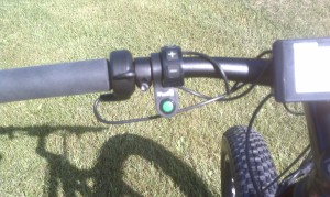 The green button screams ebike in my opinion and also clutters the handlebars.